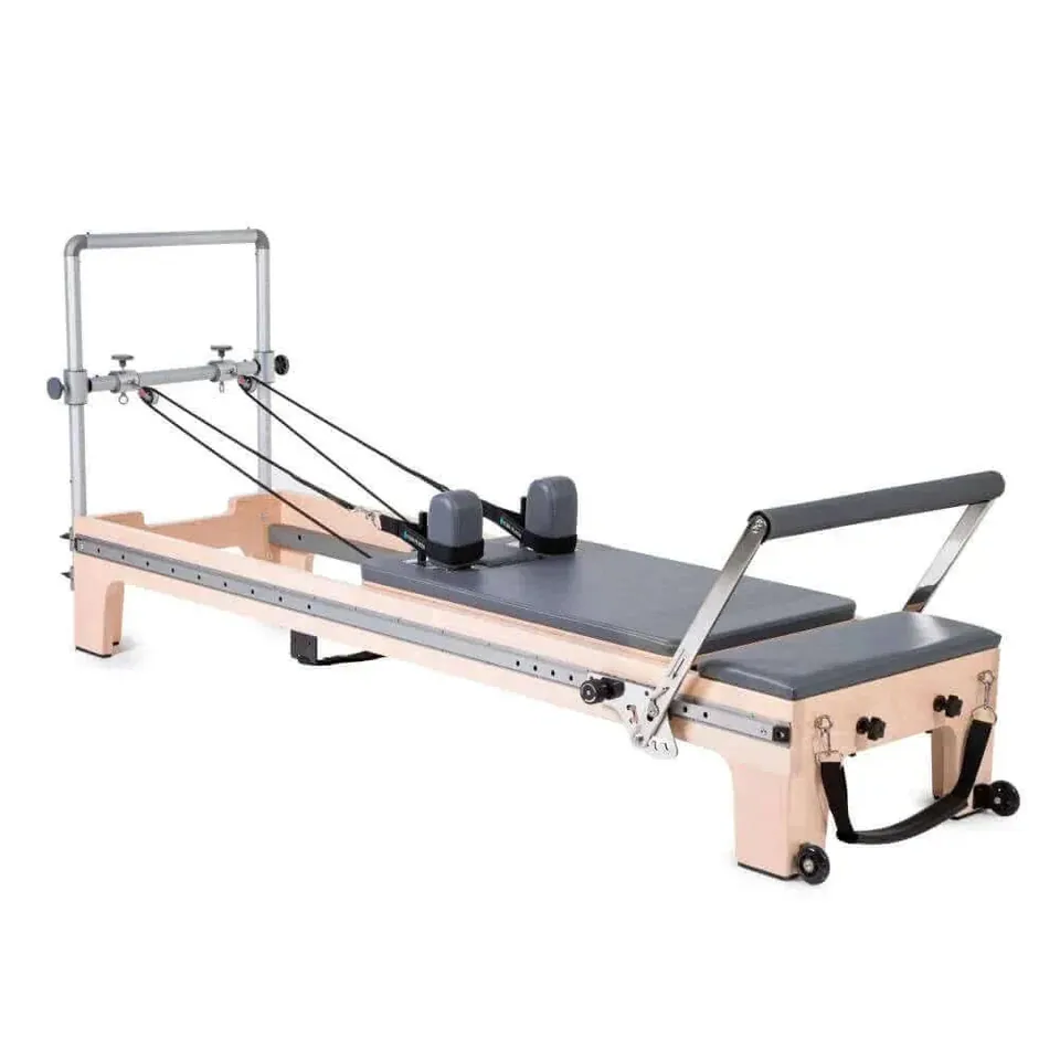 Reformer Pilates en érable avec mini tour Marée : reformers, bois, pour illustrer « Avantages et limites »
